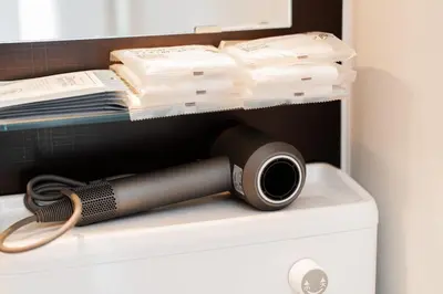 a flashlight is sitting on top of a refrigerator at 215 Building - Vacation STAY 19955 in Tokyo