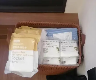 a basket filled with different types of cheese at 215 Building - Vacation STAY 19955 in Tokyo