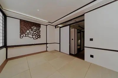 an empty room with white walls and wooden floors at 215 Building - Vacation STAY 19955 in Tokyo