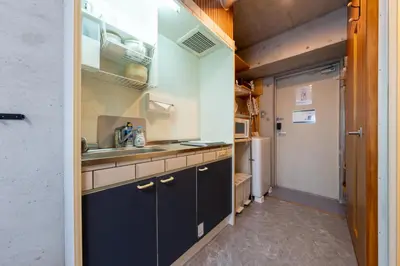 a kitchen with a sink and a refrigerator at Stayloop\u30b9\u30ab\u30a4\u30c4\u30ea\u30fc in Tokyo
