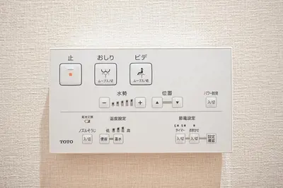 a white control panel on the side of a wall at Unite Stay Gyotoku in Tokyo