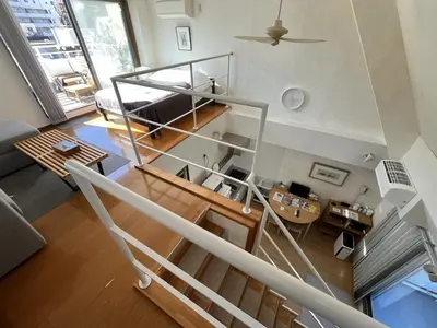 an overhead view of a living room with a staircase at Asakusa Loft in Tokyo