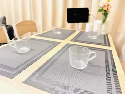 a table with three empty glasses on top of it at \u6771\u4eac\u90fd\u5fc3\u5b8c\u5168\u8cb8\u5207 \u6620\u753b\u5ba4\u6c60\u888b\u96fb\u8eca6\u5206\u65b0\u5bbf\u6e0b\u8c37\u76f4\u901aWiFI \u9577\u671fOK WAGAMAMA\u5c0f\u7af9\u5411\u539fFUJI 101\u5ba4 in Tokyo
