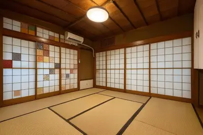 a room with tiled floors and a light on the ceiling at \u7af9\u5185\u30d3\u30eb301 in Tokyo