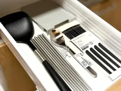 a drawer filled with utensils and a utensil at \u7af9\u5185\u30d3\u30eb301 in Tokyo