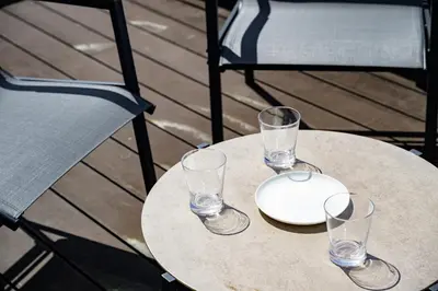 a table with four glasses and a plate on it at \u4e94\u53cd\u91ce in Tokyo