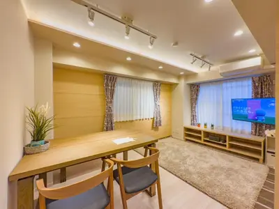 a home office with a desk and a flat screen tv at \u7530\u753a6Floor-MT0393 in Tokyo