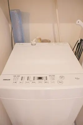 a close up of a toilet in a bathroom at japan House\u30b9\u30ab\u30a4\u30c4\u30ea\u30fc\u99c5\u5f92\u6b695\u5206\u30f4\u30a3\u30e9\u8cb8\u5207 2\u53f7\u9928 in Tokyo
