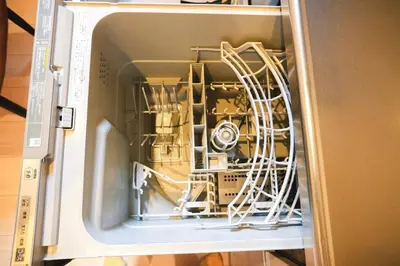 an open microwave oven withabling inside of it at japan House\u30b9\u30ab\u30a4\u30c4\u30ea\u30fc\u99c5\u5f92\u6b695\u5206\u30f4\u30a3\u30e9\u8cb8\u5207 2\u53f7\u9928 in Tokyo