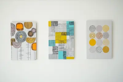 three pages of paper with orange and yellow patterns at Tomo House Oshiage - from 2 minutes station \u62bc\u4e0a \u99c5\u304b\u3089\u5f92\u6b692\u5206 in Tokyo