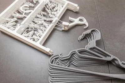 a white plastic tray with a bunch of white wires at Hanna Inn Zoshigaya in Tokyo