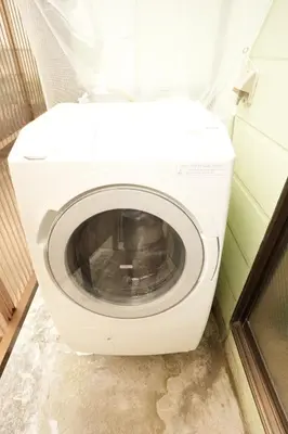 a white toilet in a bathroom with its seat up at Aki Hiroo Stay 101 in Tokyo