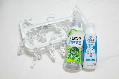 a couple of bottles of toothpaste and a toothbrush at Aki Shin-Okubo Stay 105 in Tokyo