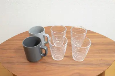 a group of empty glasses sitting on a table at Aki Shin-Okubo Stay 105 in Tokyo