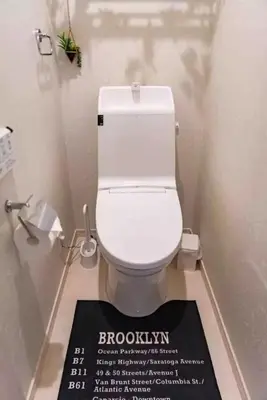 a bathroom with a white toilet in a stall at lkebukuro-Five palace in Tokyo