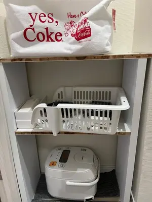 a closet with a toilet and a bag on a shelf at \u65b0\u7530201\u6210\u7530\u7fbd\u7530\u673a\u573a\u76f4\u8fbe\u6b65\u884c\u53ef\u62b5\u8fbe\u79cb\u53f6\u539f\u6700\u8fd1\u8f66\u7ad95\u5206\u949f in Tokyo