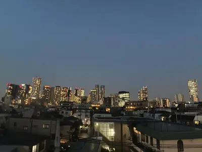 a view of a city skyline at night at share's TOKYO Japandi Design Apartment Near Shinjuku in Tokyo