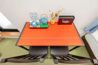 an orange table with items on top of it at Akihabara Skytree Premium Apartment 201 in Tokyo