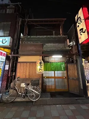 a bike parked in front of a building at NakanoRetreat in Tokyo