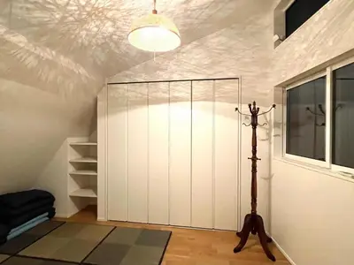 a room with a white closet with a glass door at Detached Villa 4LDK Free Parking, 4 min walk to Sengawa Station, Toshima Ward in Tokyo