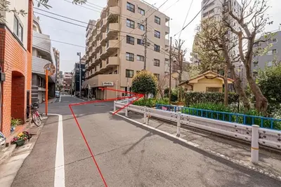 an empty street with a red line on the street at Akihabara Skytree Premium Apartment 302 in Tokyo