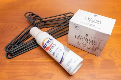 a bottle of laundry detergent and a box of laundry therapy at Shinjuku Homely Stay in Tokyo