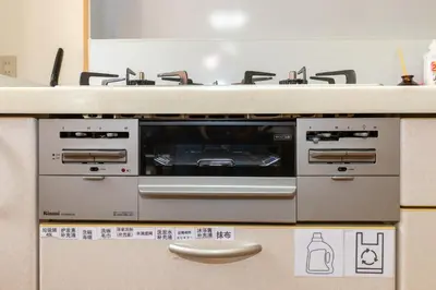 a kitchen with two burners on top of a counter at Mi-APT Nakaitabashi Near Ikebukuro in Tokyo