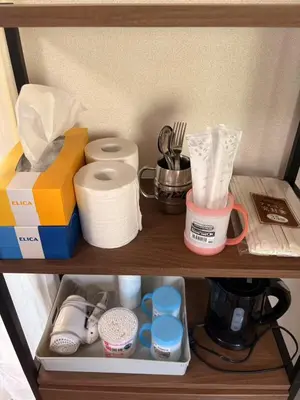 a shelf with toilet paper and other items on it at JapanHouse Takadanobaba #Shinjuku Area in Tokyo