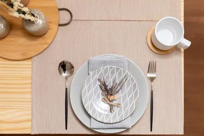 a table with a plate and fork and a cup of coffee at Guest Residence Kanamecho in Tokyo