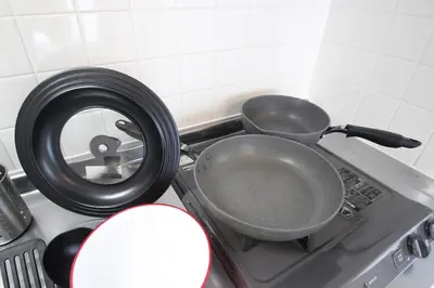 a pot and pans sitting on top of a stove at arpeggioTERRACE 701 in Tokyo