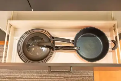 a pan sitting in a box on a shelf at My Sumida Home A in Tokyo