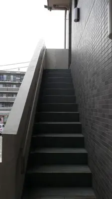 a stairway leading up to a building at Sakura house in Tokyo