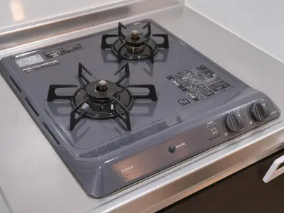 a stove top with two burners on top of it at m2\u30db\u30c6\u30eb in Tokyo