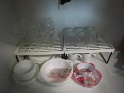 a kitchen with wine glasses and dishes on shelves at \u6e0b\u8c37\u533a\u4ee3\u3005\u6728302 in Tokyo
