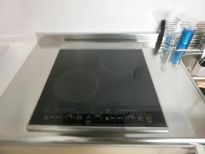 a laptop computer sitting on top of a counter at \u6e0b\u8c37\u533a\u4ee3\u3005\u6728302 in Tokyo