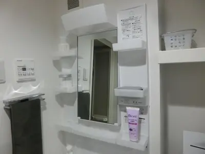 a bathroom with a mirror and a sink at \u6e0b\u8c37\u533a\u4ee3\u3005\u6728302 in Tokyo