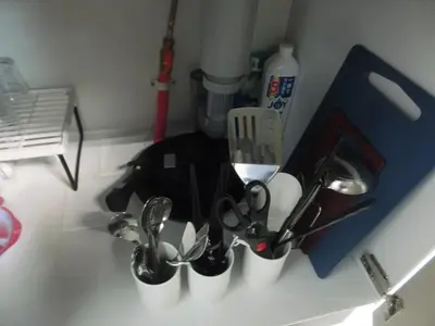 a group of utensils in cups on a counter at \u6e0b\u8c37\u533a\u4ee3\u3005\u6728302 in Tokyo