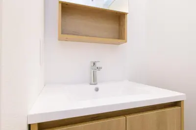 a bathroom with a white sink and a medicine cabinet at 8min walk from Shibuya Sta in Tokyo