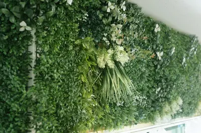 a green wall with a bunch of vegetables on it at 8min walk from Shibuya Sta in Tokyo