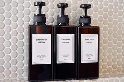 two bottles of soap sitting next to each other at 5min to Shibakoen 49square meters Cozy Stay Near Tokyo Tower in Tokyo