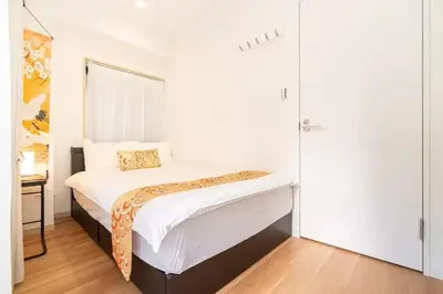 a small bedroom with a bed in a room at My Sumida Home 2A in Tokyo