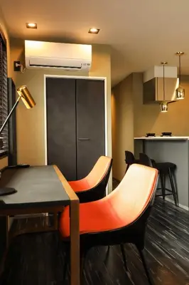 a dining room with a table and chairs at the Moto Hotel Ueno in Tokyo