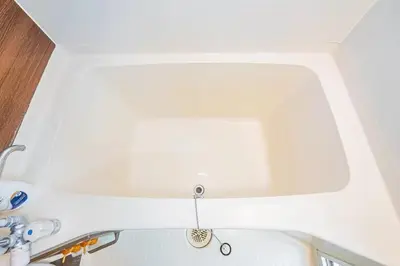 a kitchen with a white counter top with a sink at My Sumida Home 2B in Tokyo