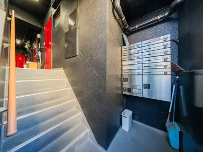 a stairway in a room with stairs and a toilet at Tokiwa INN in Tokyo