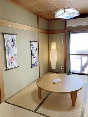 a living room with a table and a lamp at Shinagawa-ku - House - Vacation STAY 19990 in Tokyo