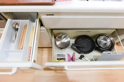 a kitchen cabinet filled with dishes and utensils at Sumida-ku - Apartment - Vacation STAY 19991 in Tokyo