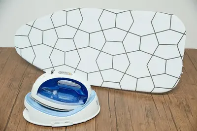 a white blender sitting on a wooden floor at Poco Land in Tokyo