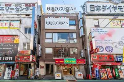 a street in an asian city with many shops at 365Ueno in Tokyo