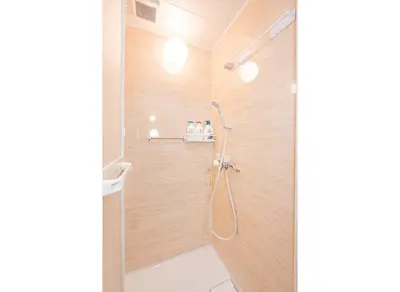 a bathroom with a shower with wooden walls at Mori House \u795e\u697d\u5742 in Tokyo