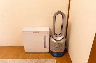 a small appliance is sitting next to a wall at Homie Hiroo in Tokyo